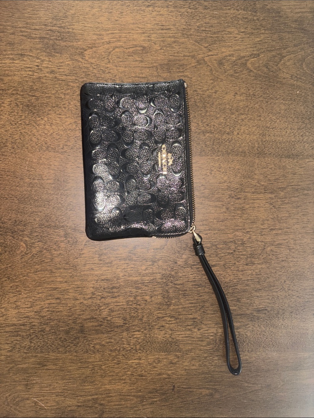 Coach Black Embossed Signature Wristlet Pouch with Gold Logo